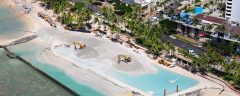 Dewatering sand for placement on Waikiki Beach